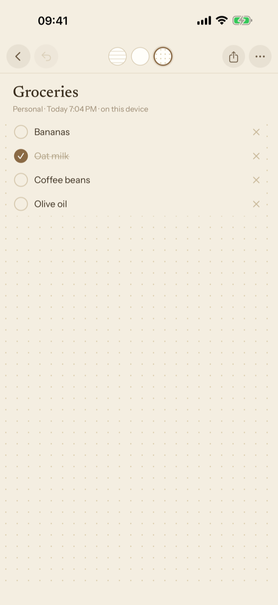 A note with a checklist on dotted paper.
